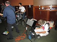 hard at work, or hardly working?